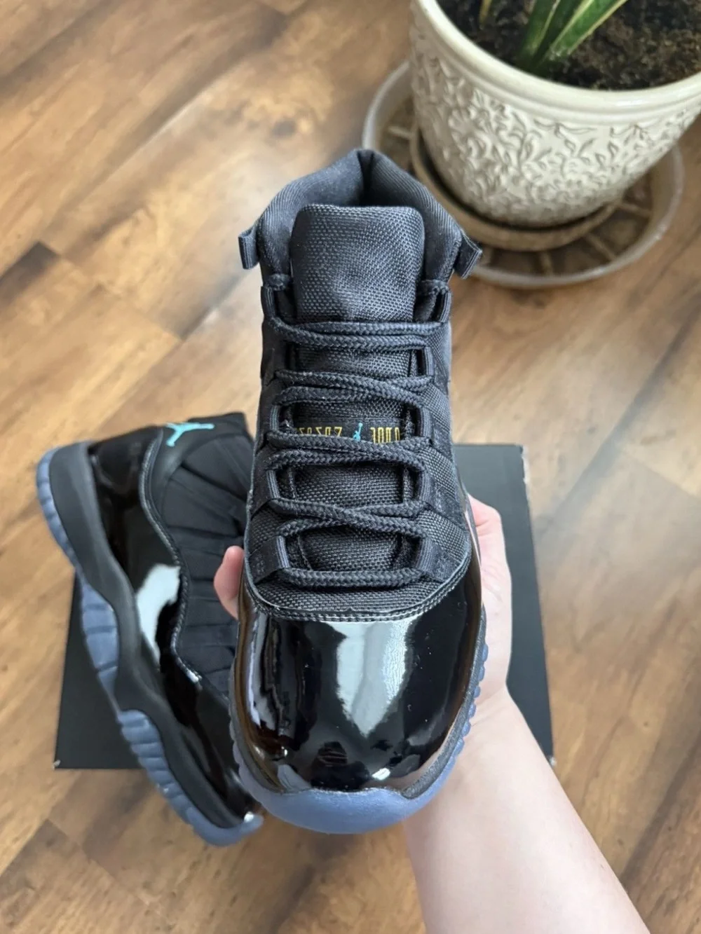 Jordan 11 Retro Black with Teal Accents